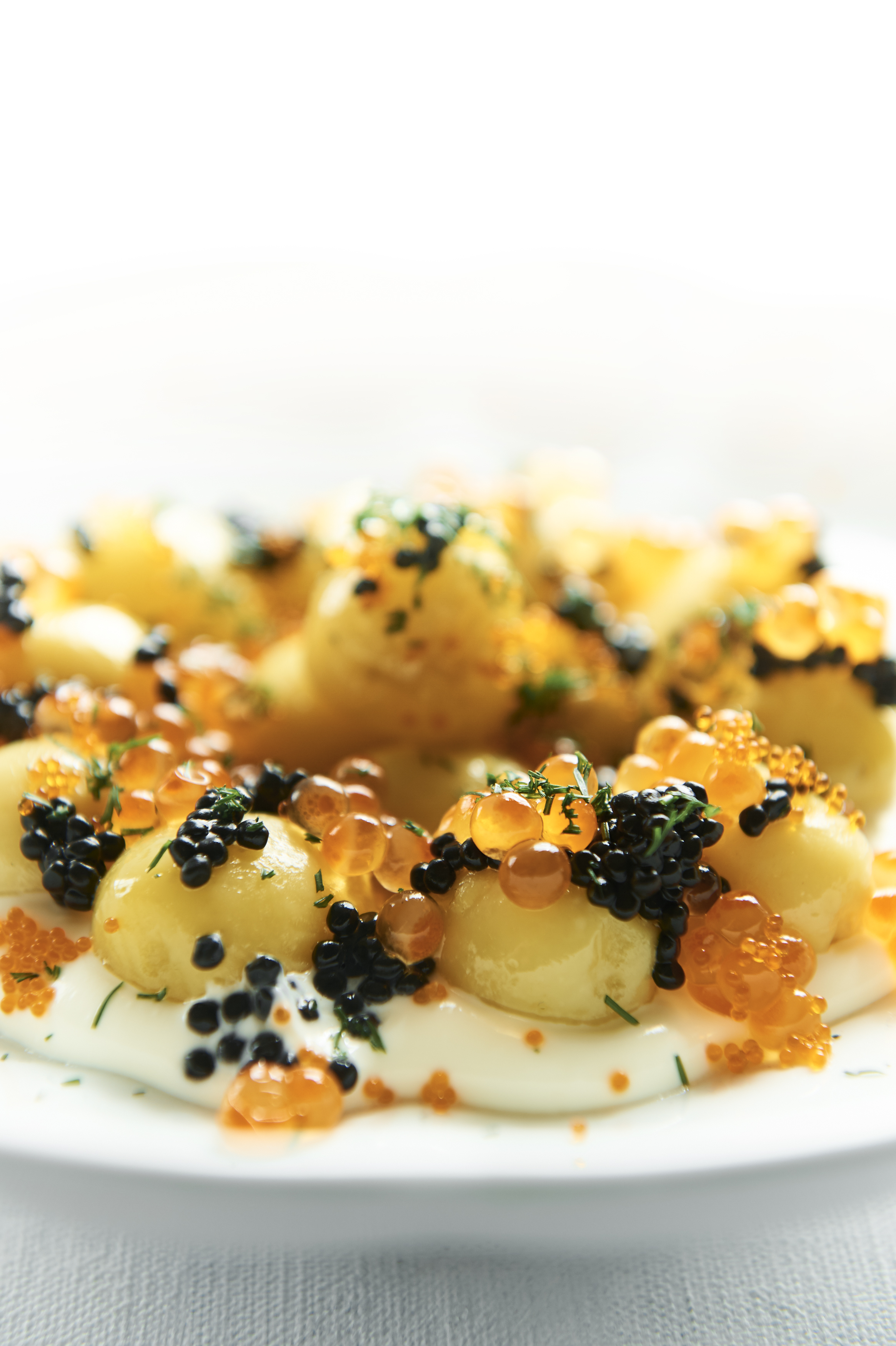 Potato salad with Avruga, tobiko and salmon roe