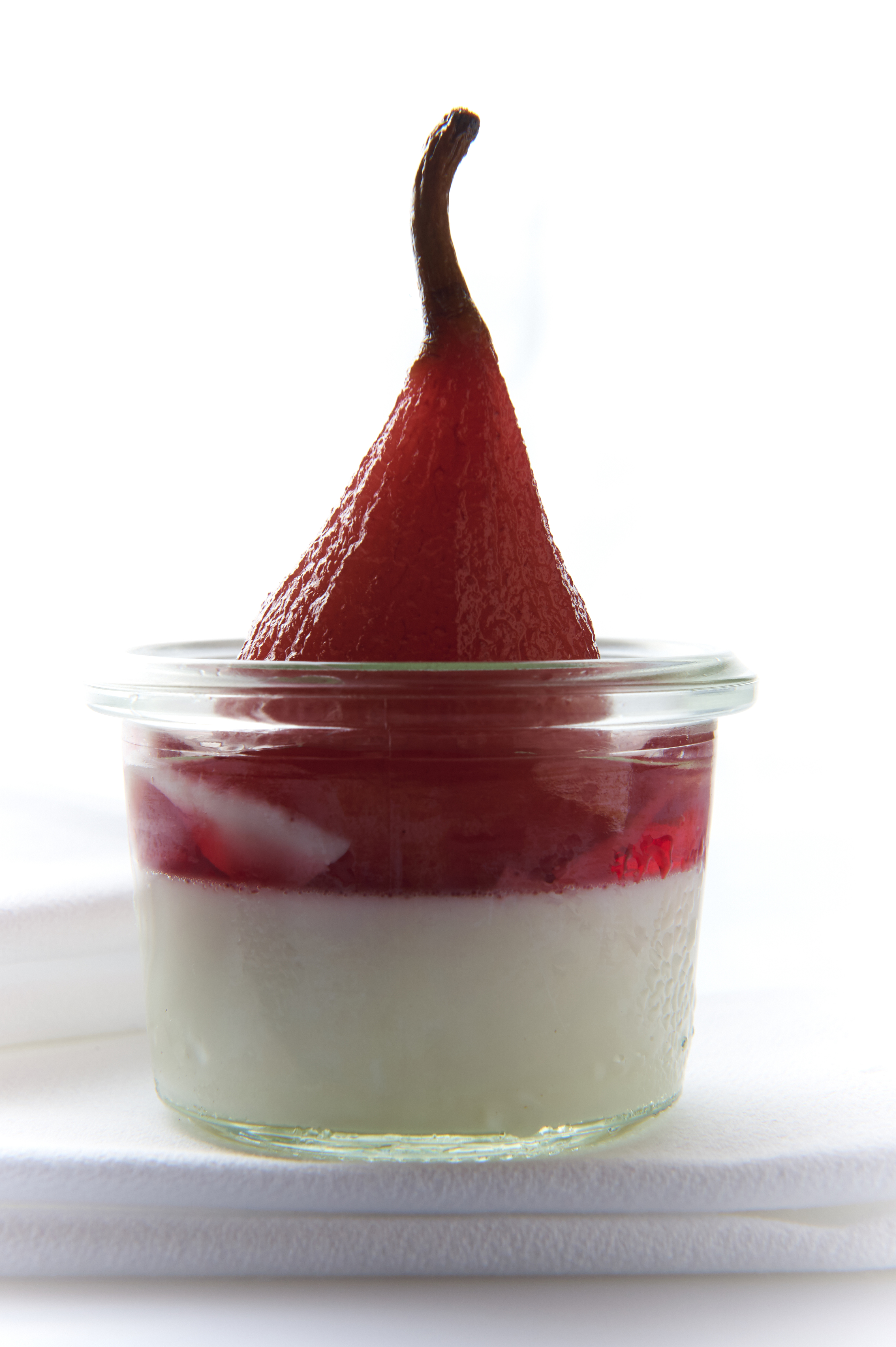 Pot-set yoghurt with hibiscus poached pears