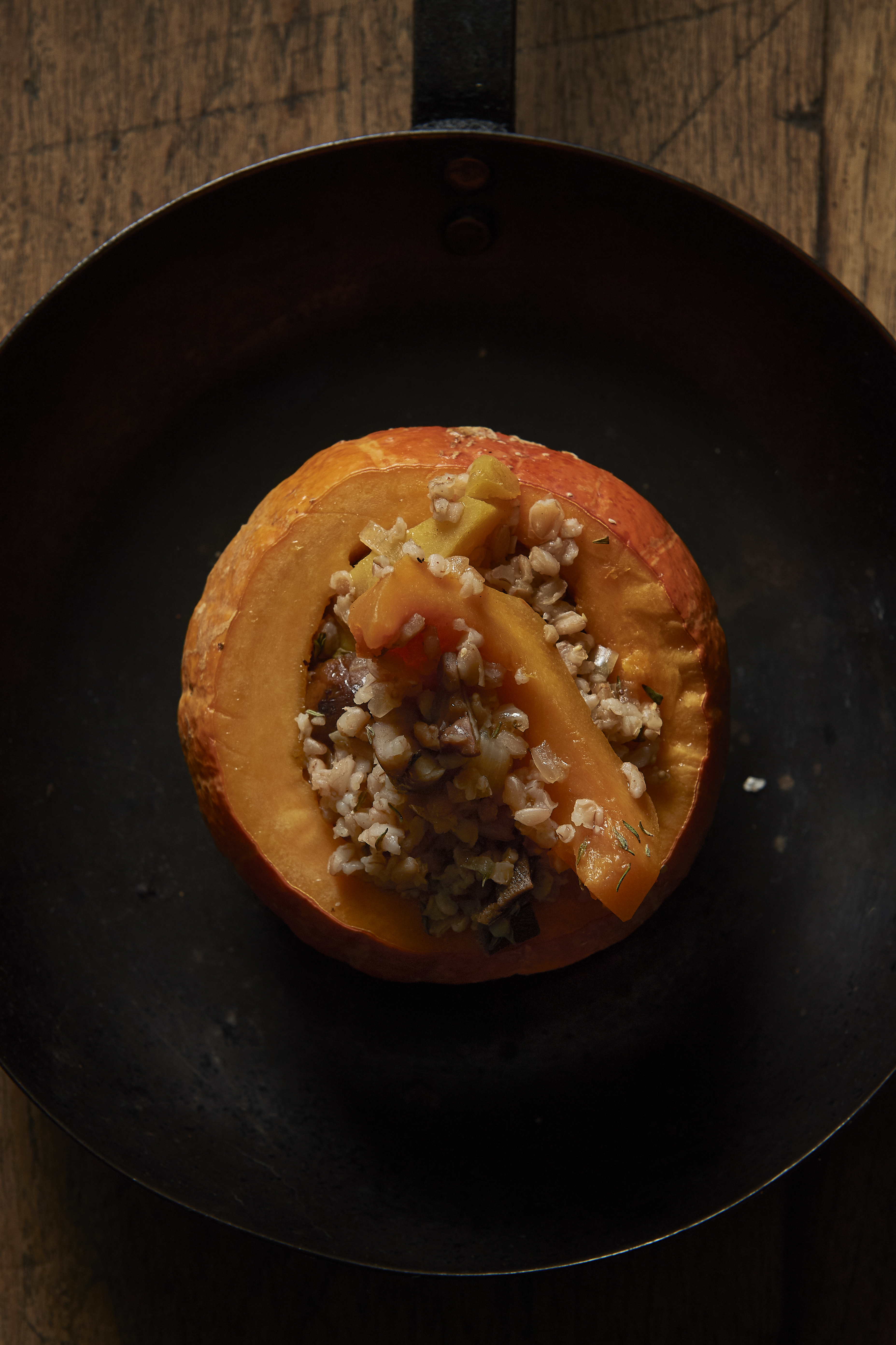 Pumpkin stuffed with farro, chestnut and mushrooms