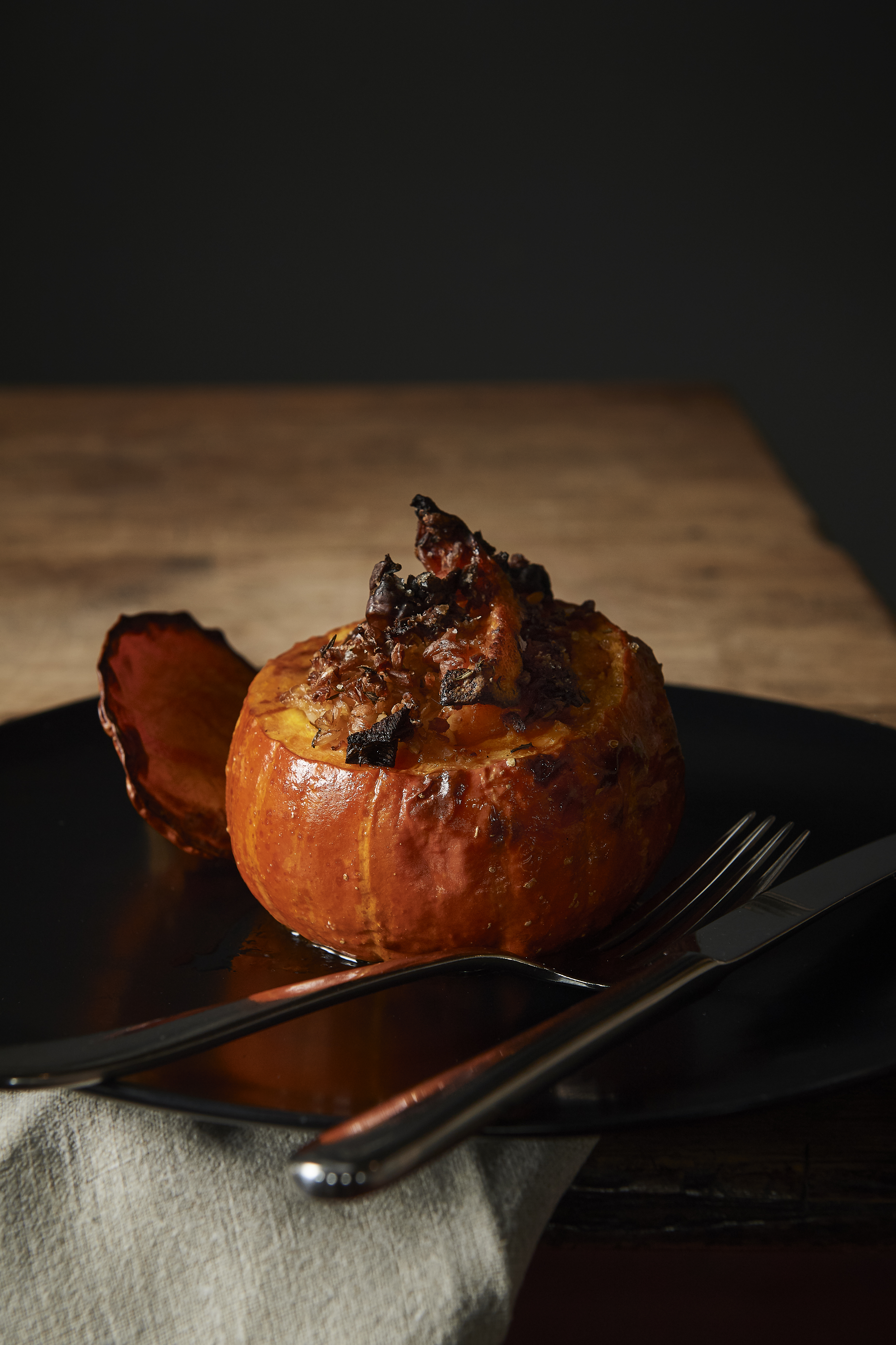 Pumpkin stuffed with farro, chestnut and mushrooms