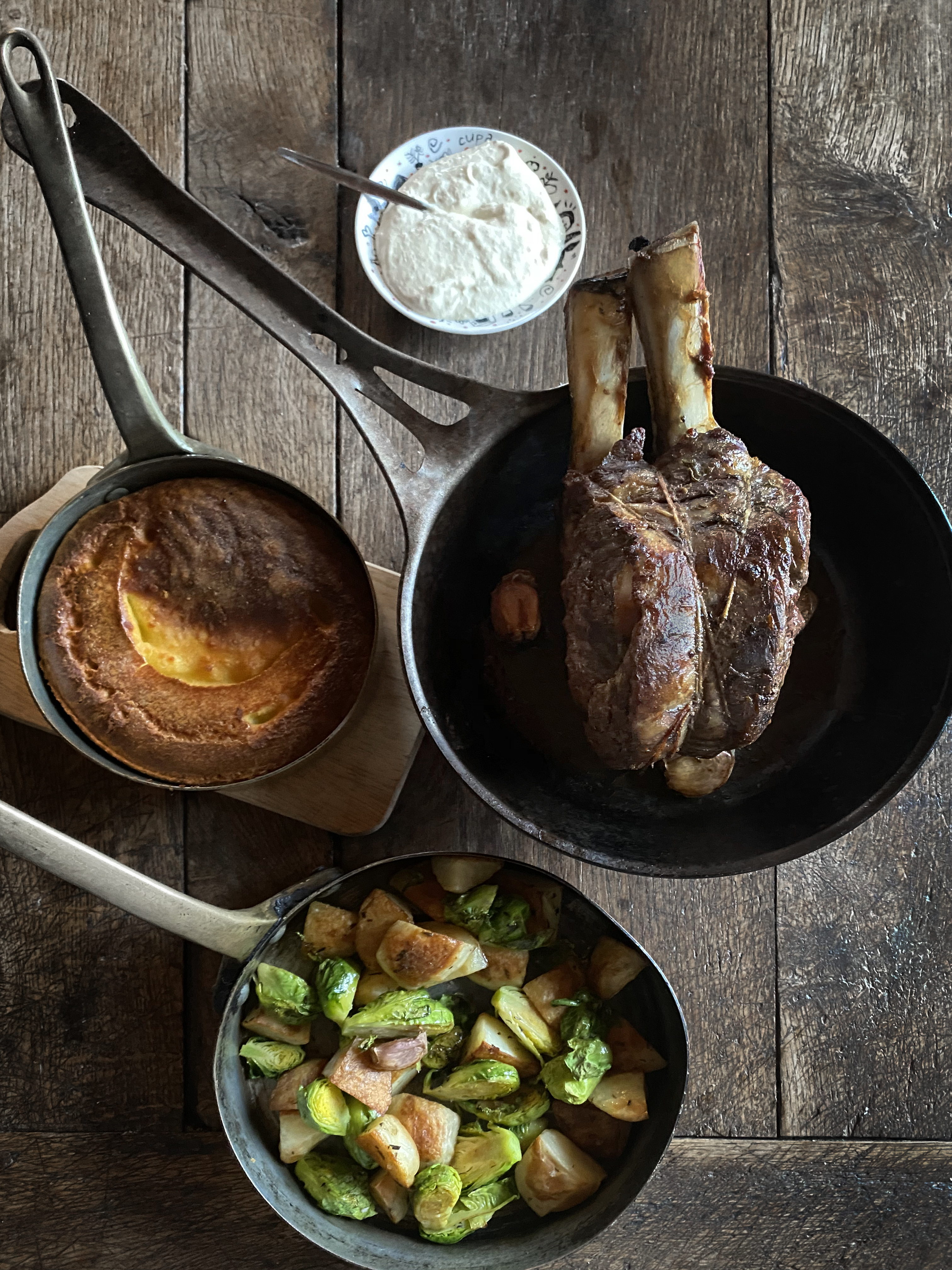 Standing rib roast with potatoes, brussels sprouts and Yorkshire pudding