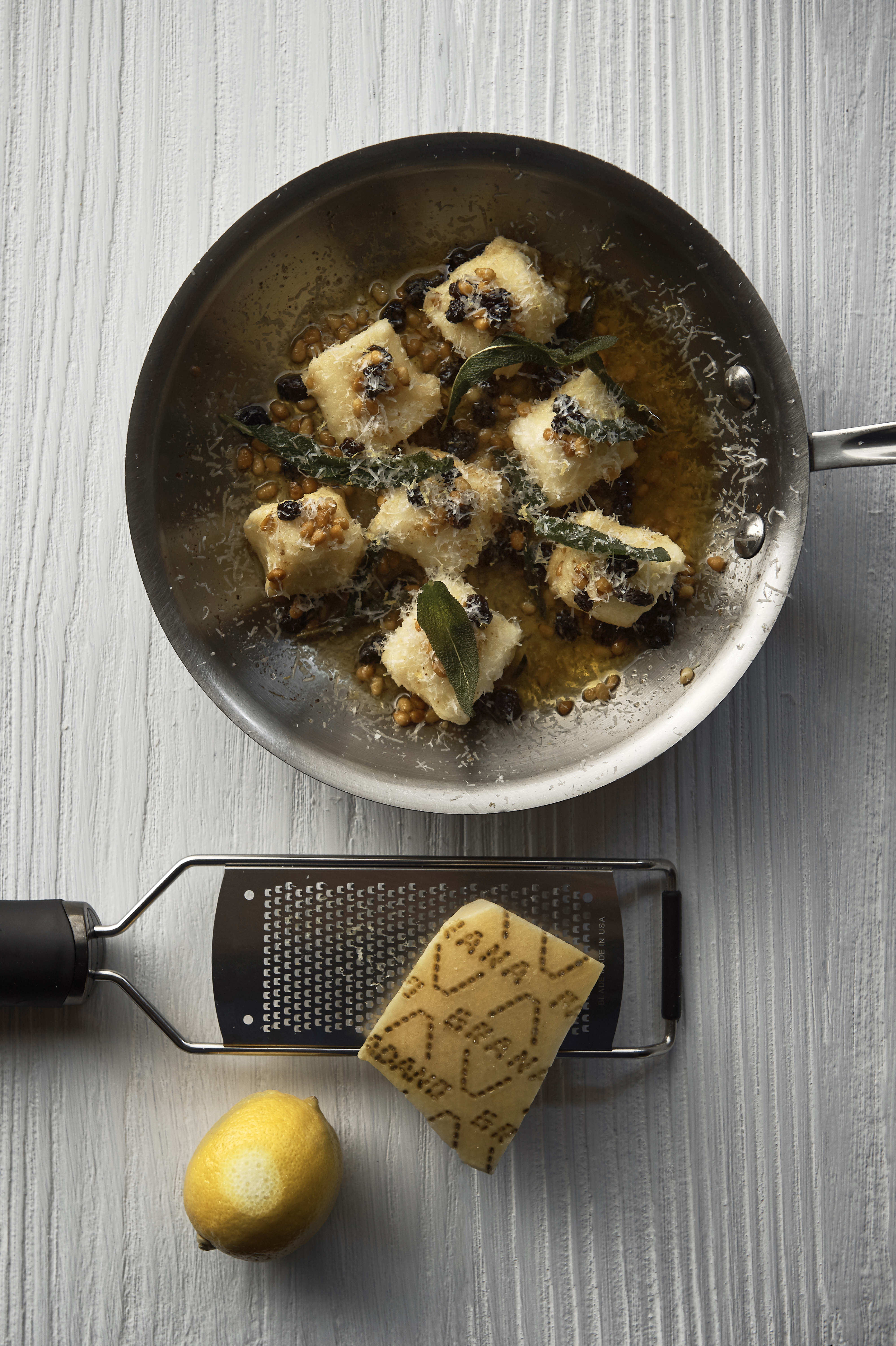 Ricotta dumplings with burnt butter, pine nuts and sage
