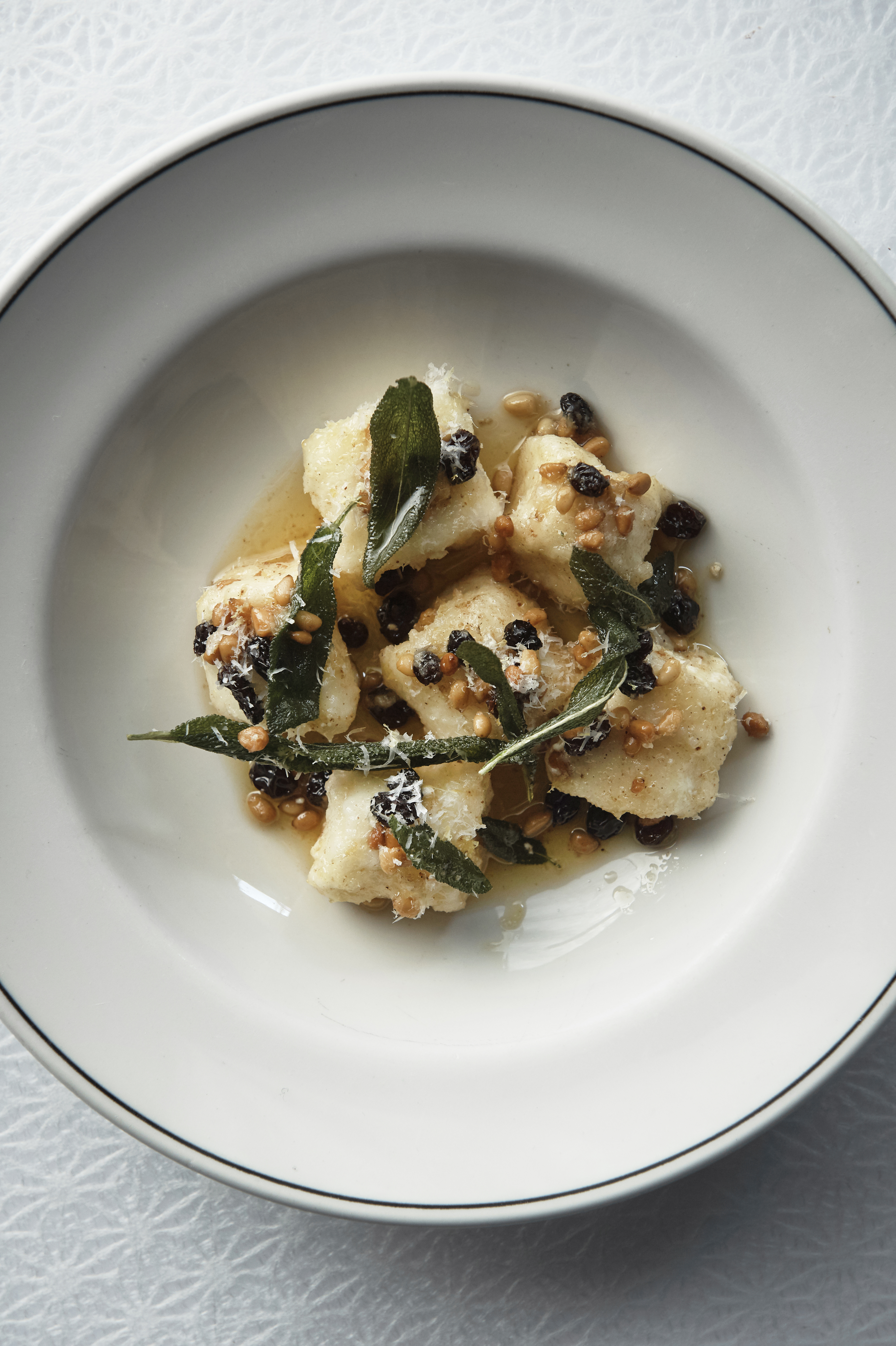 Ricotta dumplings with burnt butter, pine nuts and sage