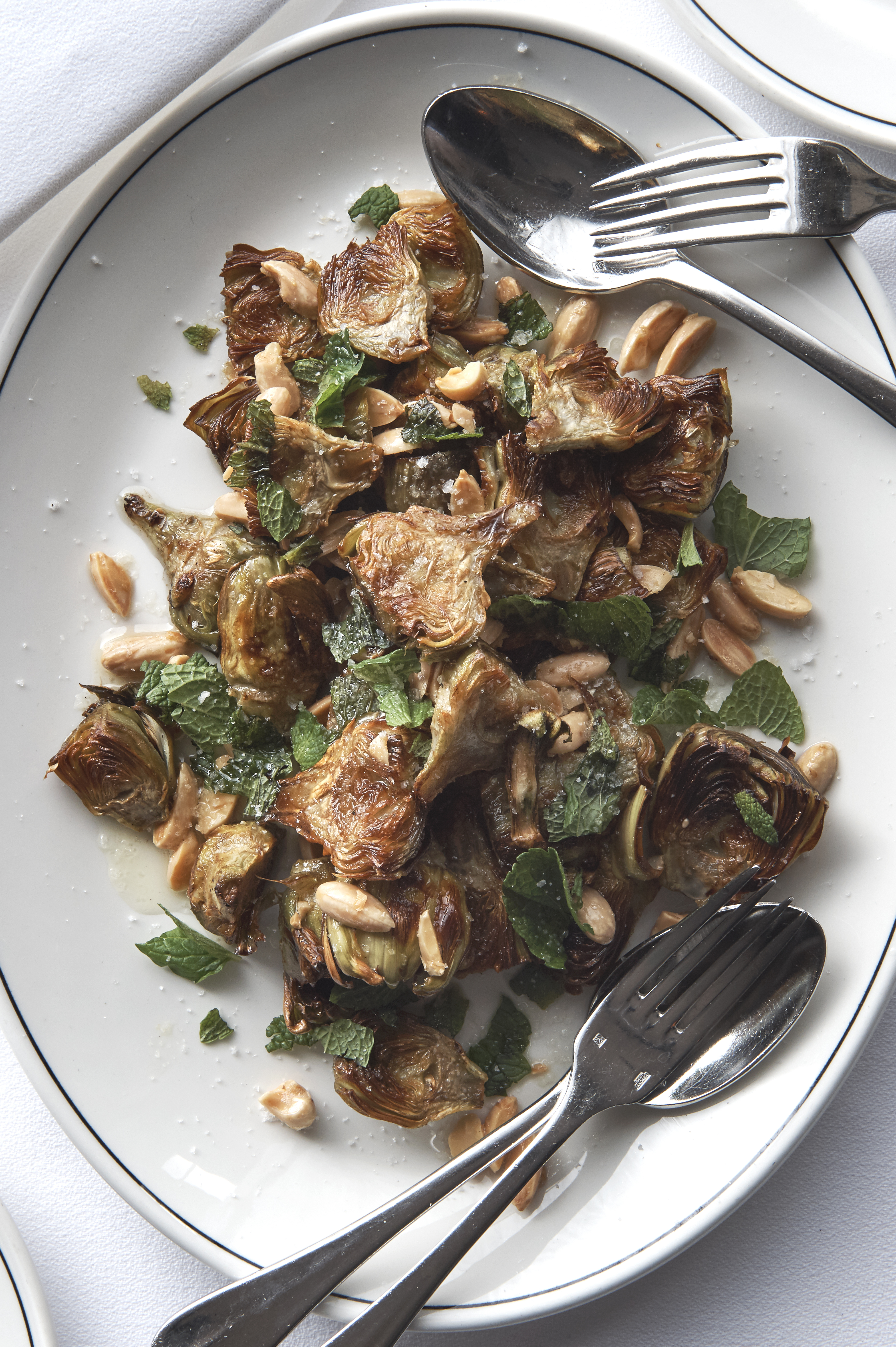 Roast artichokes with almonds and mint