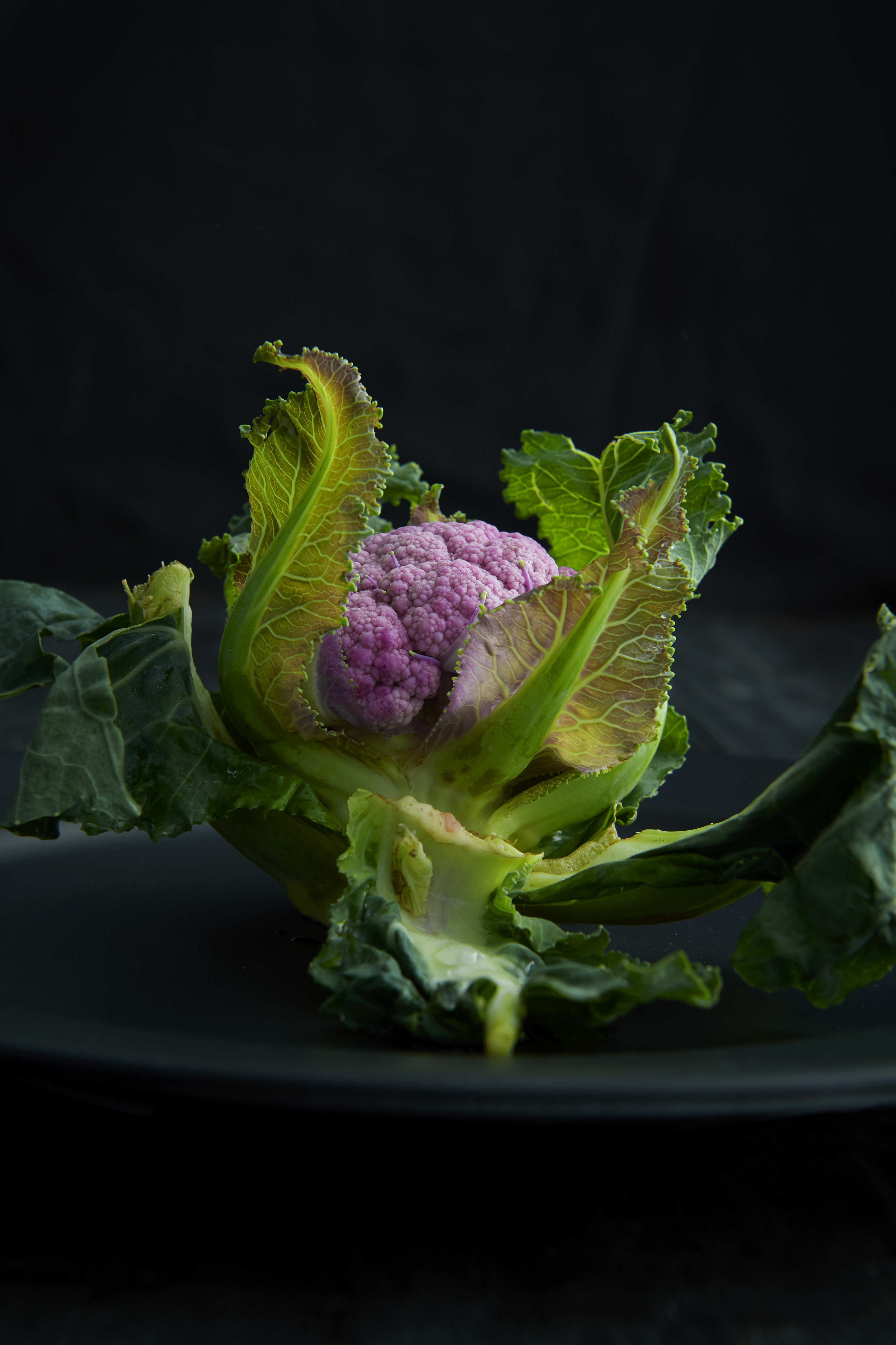 Whole roasted baby cauliflower with tahini yoghurt and toasted cumin