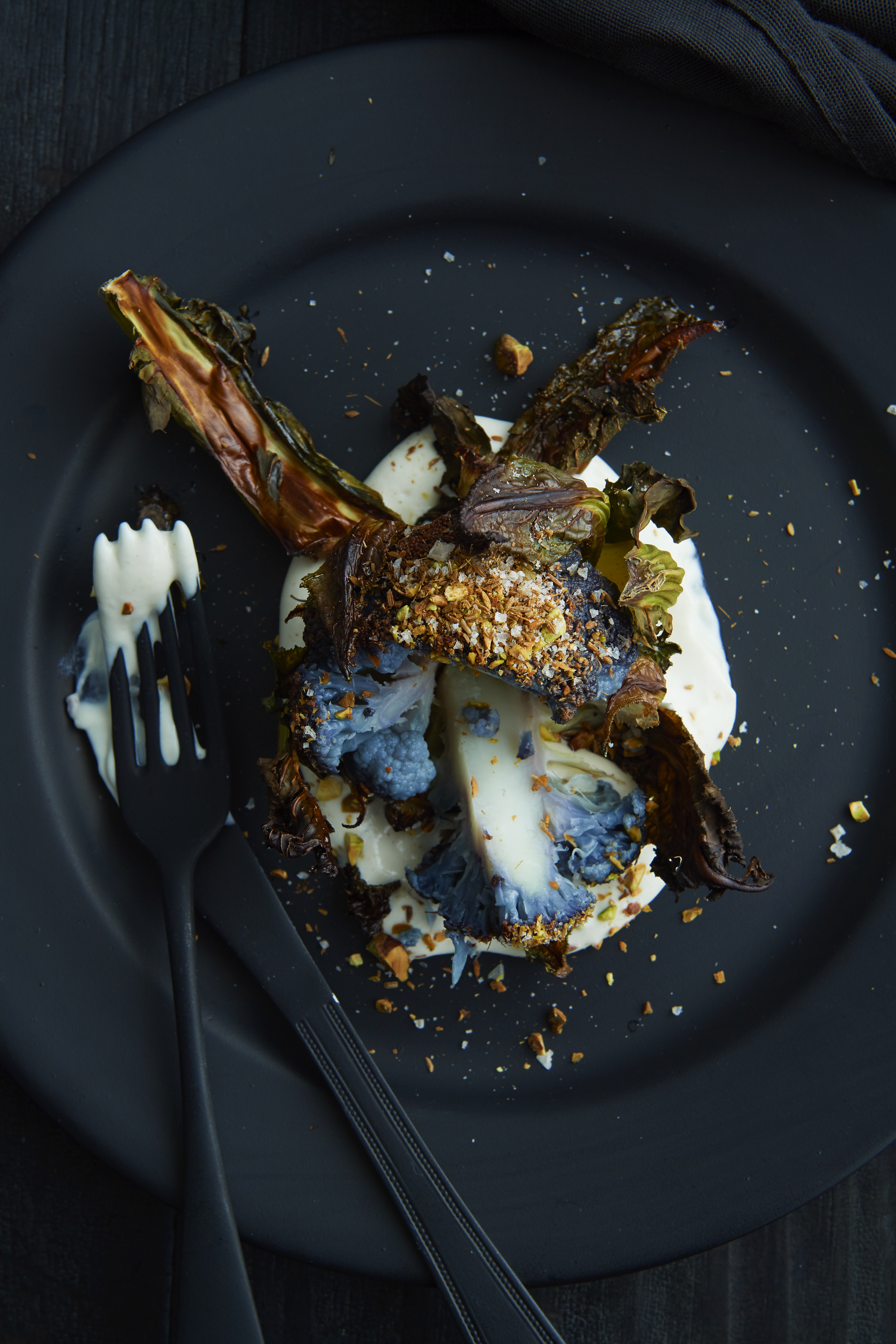 Whole roasted baby cauliflower with tahini yoghurt and toasted cumin