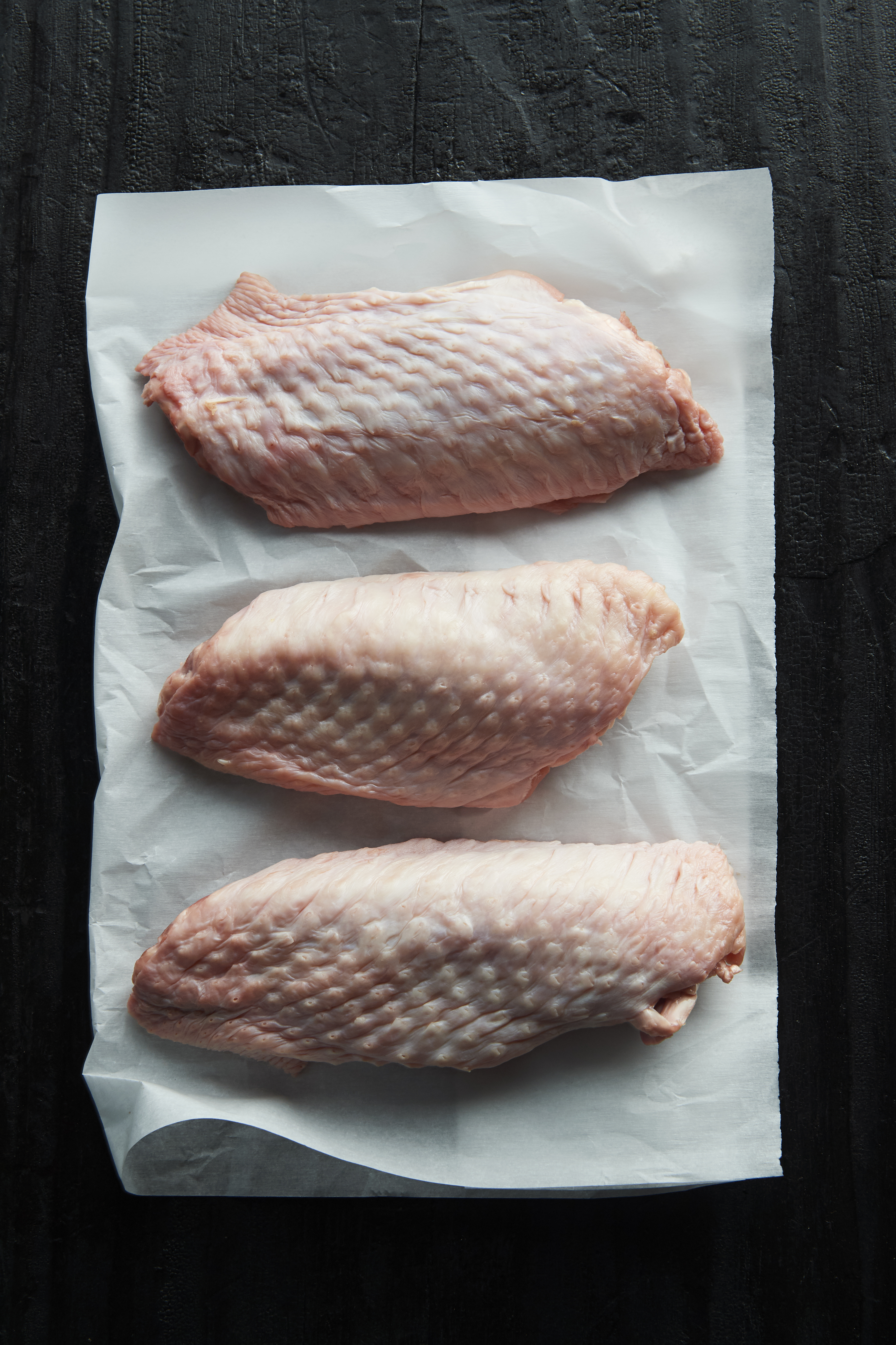 Twice-cooked turkey wings with black pudding and shiitake mushrooms