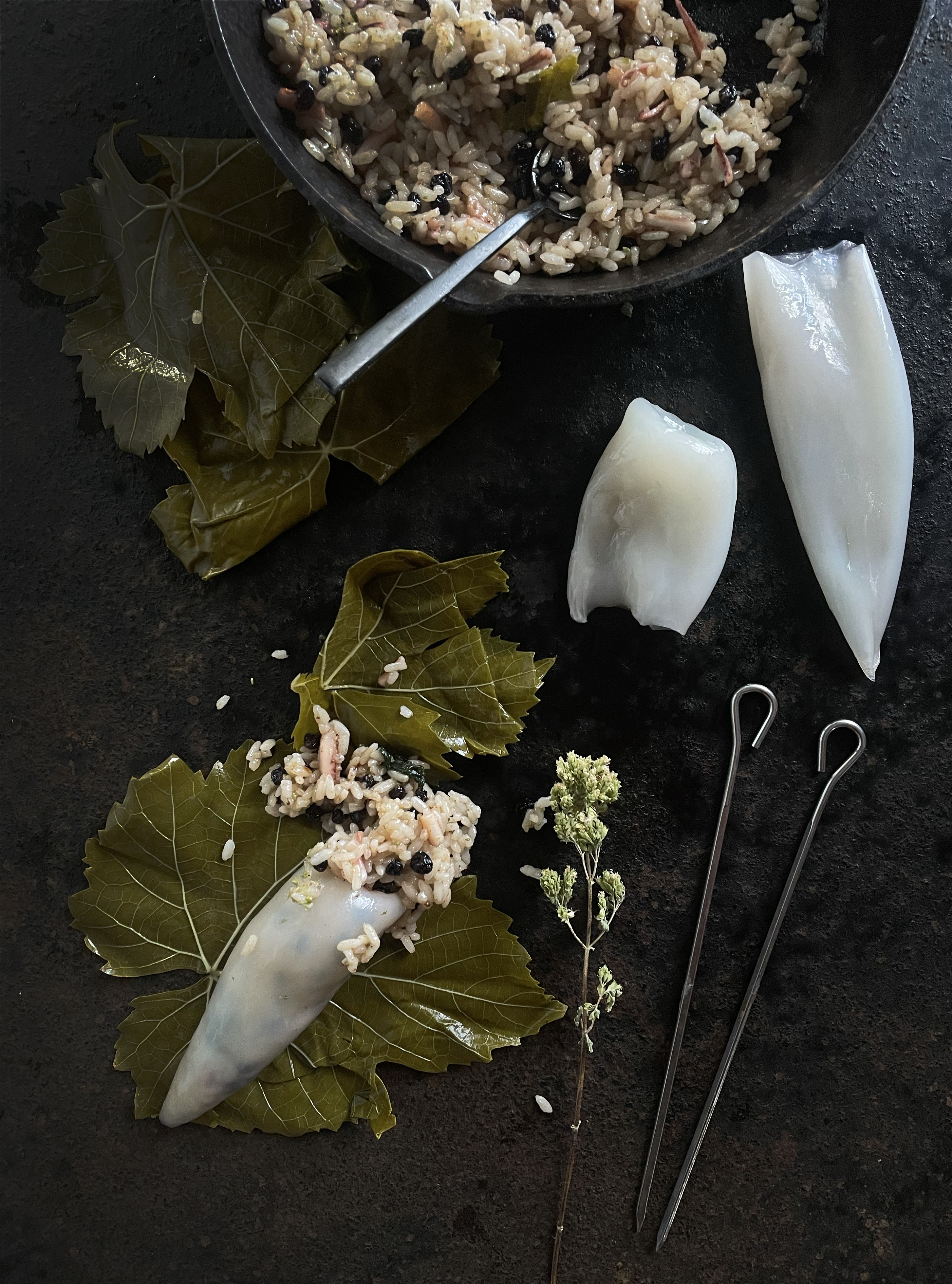 Stuffed squid in vine leaves
