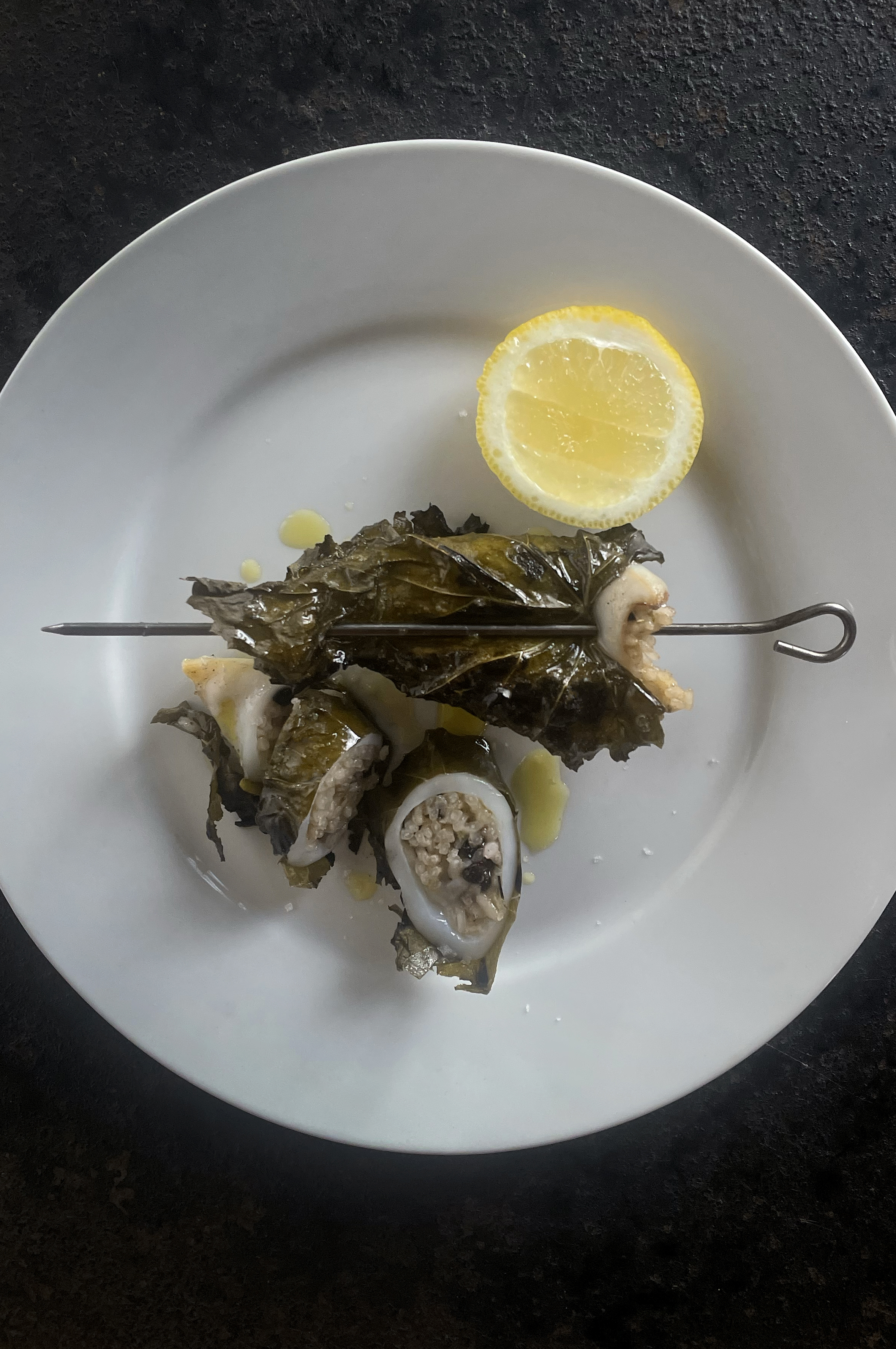Stuffed squid in vine leaves