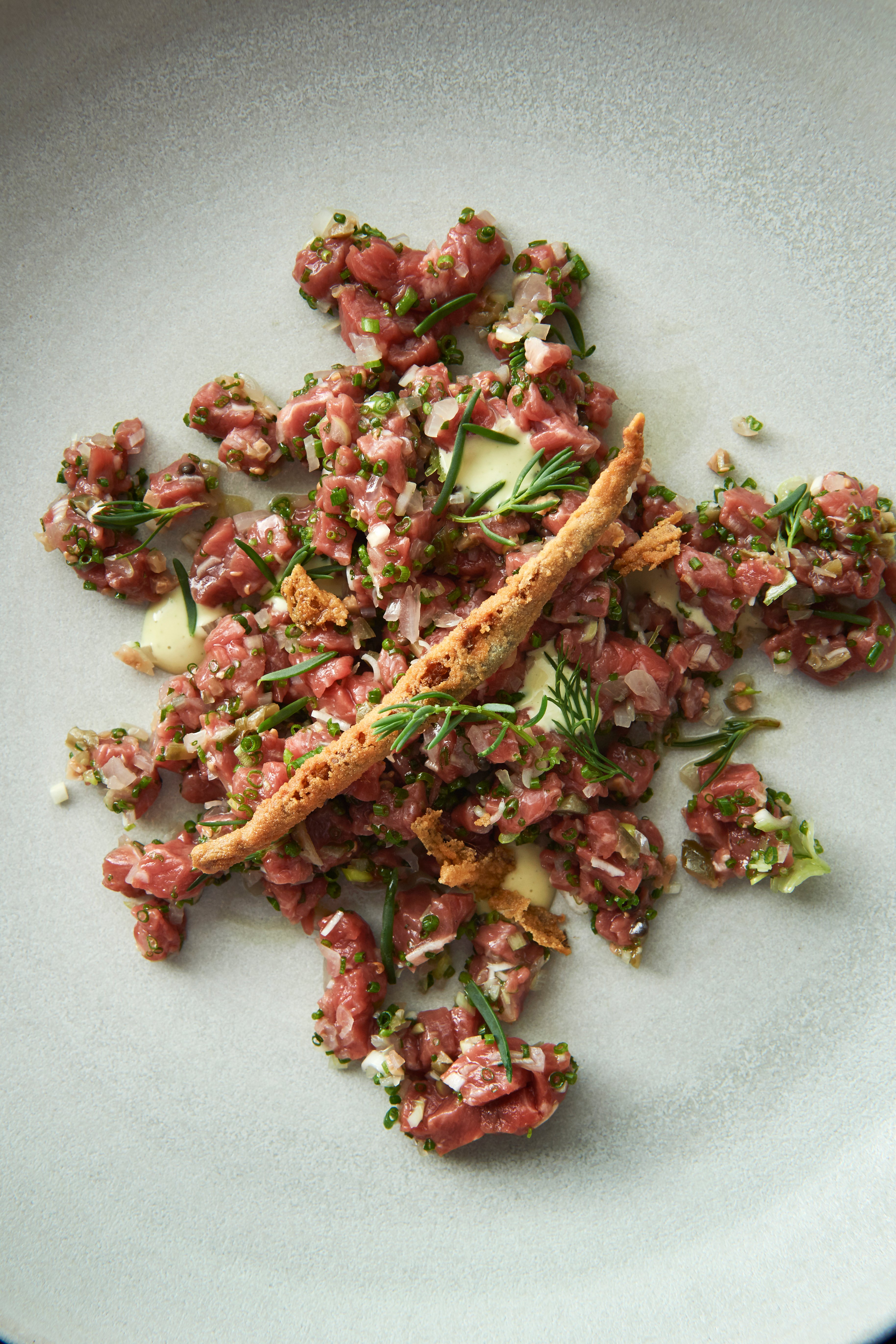 Beef tartare, tarragon mayonnaise and fried anchovy