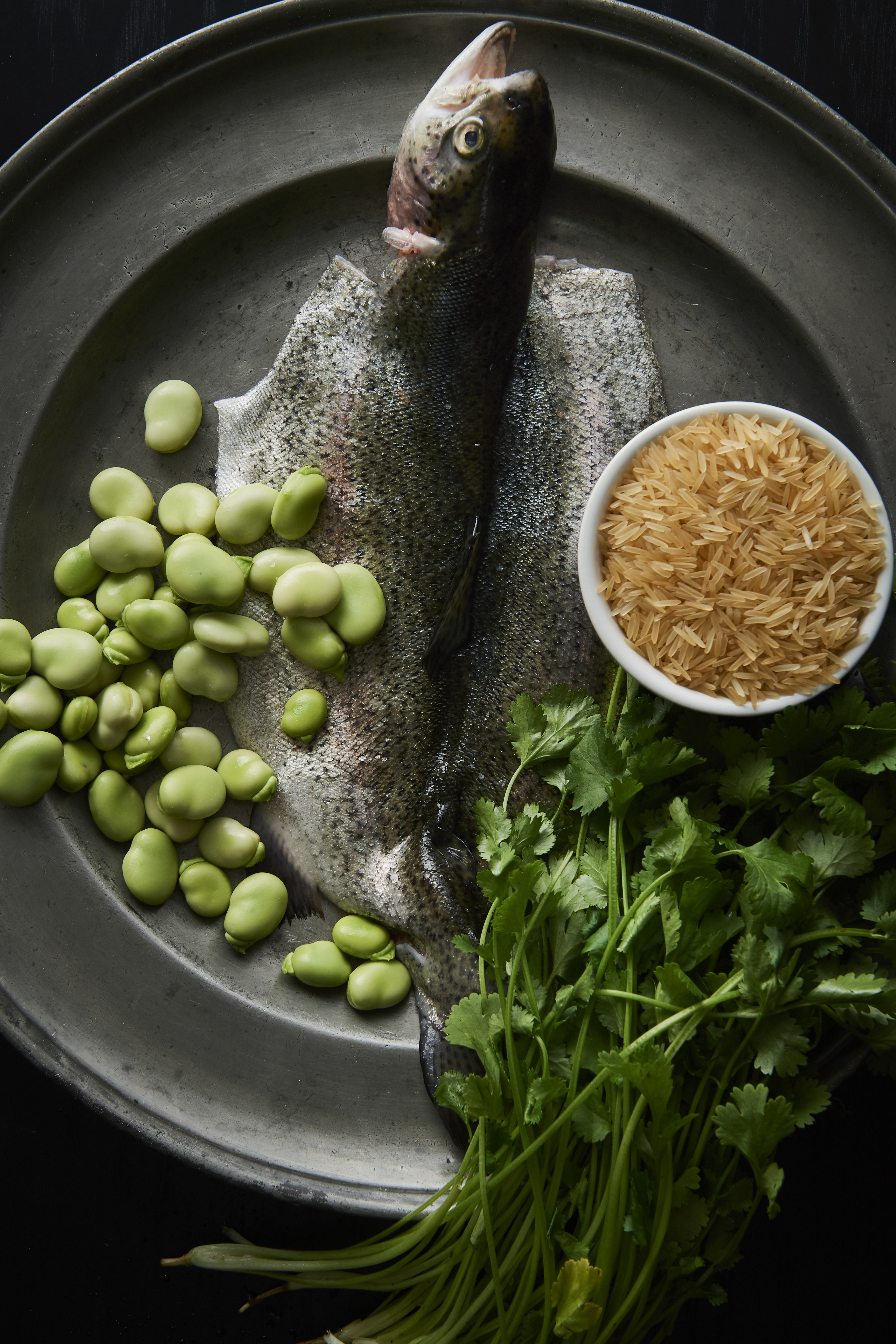 Stuffed rainbow trout with dill and broad bean pilaf