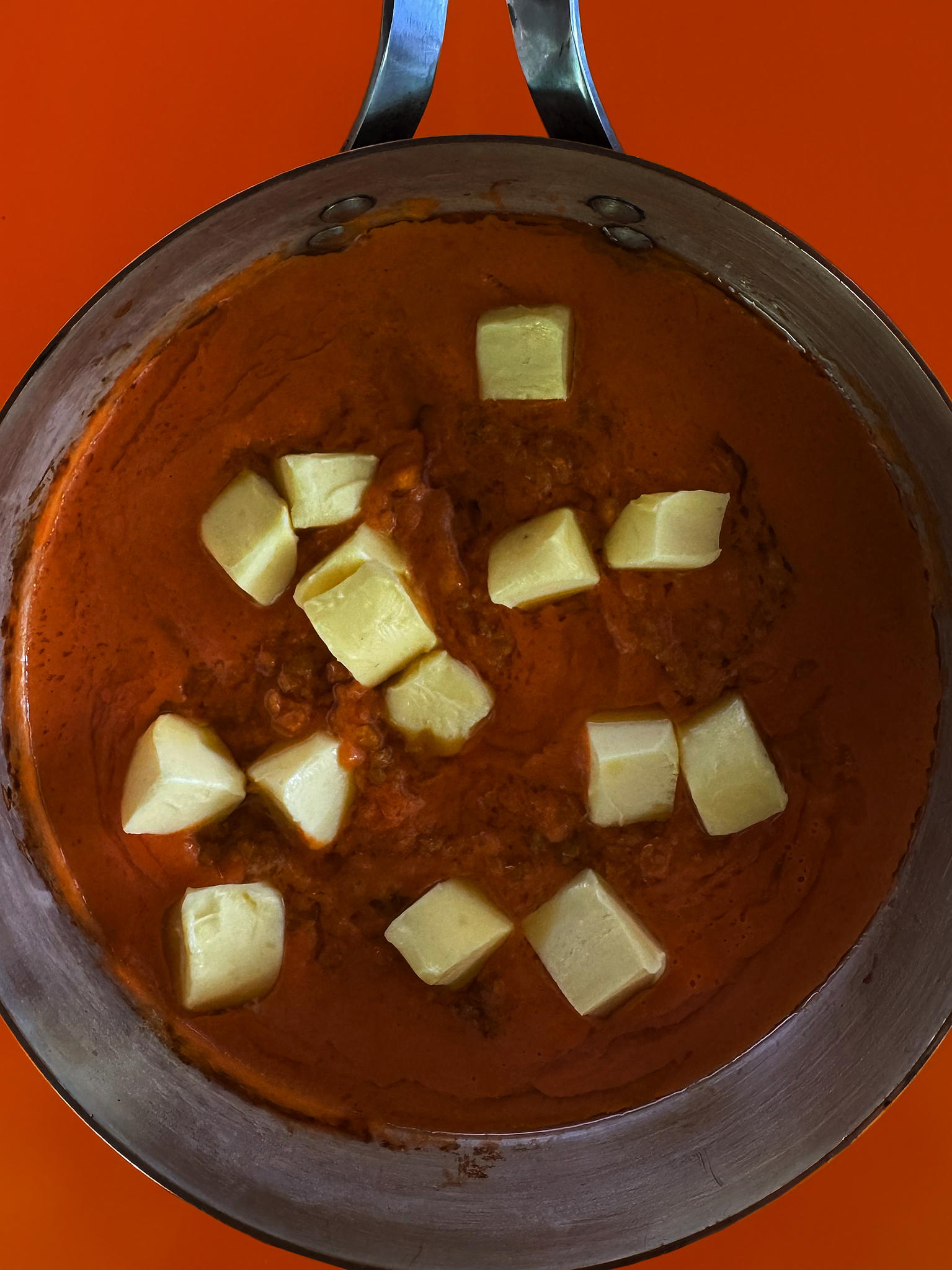 Fried blue-eye in tomato butter sauce