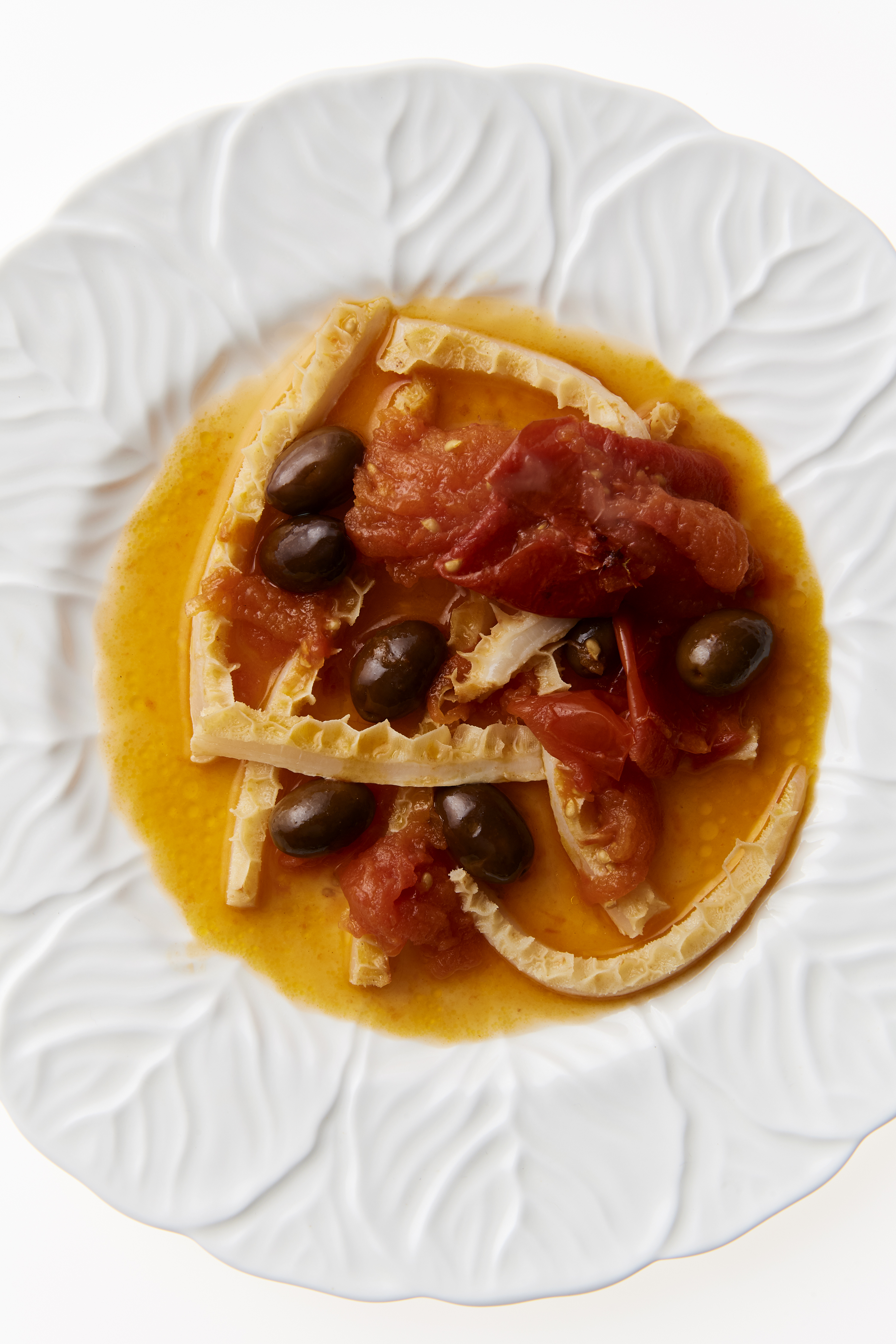 Tripe with olives and roasted tomato