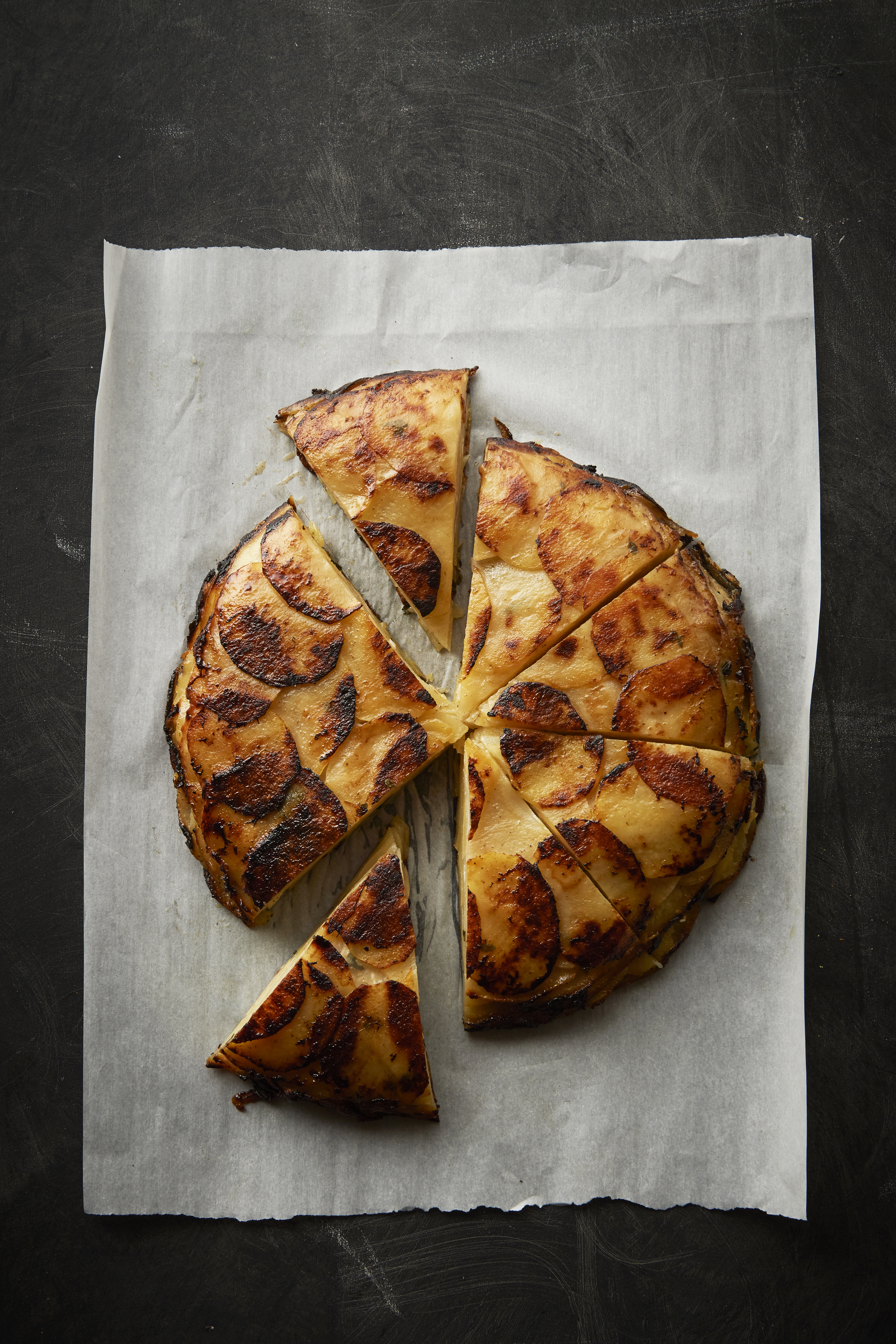 Baked celeriac and potatoes with honey, cinnamon and thyme