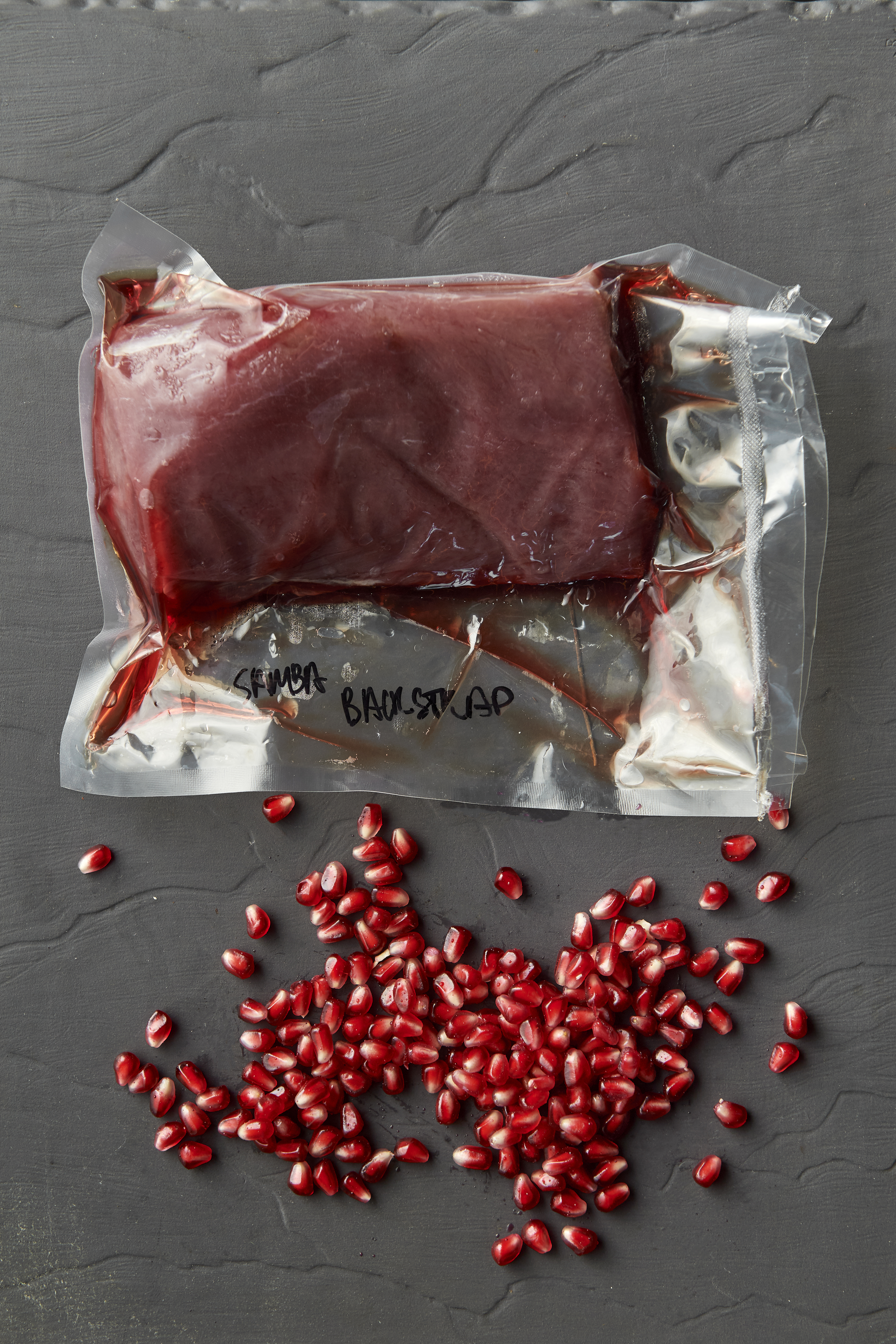 Grilled wild deer with pomegranate, fig and mustard leaf
